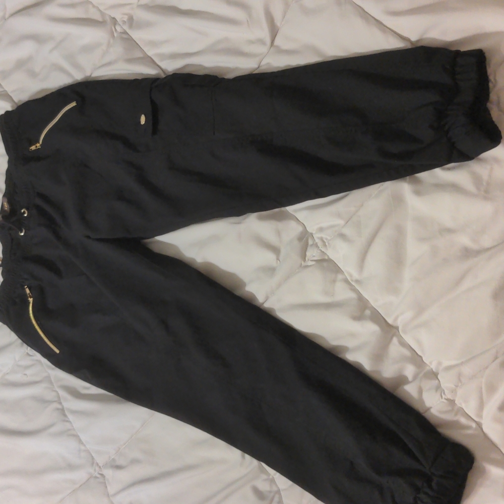 Black Jaanuu jogger scrub bottoms. Medium